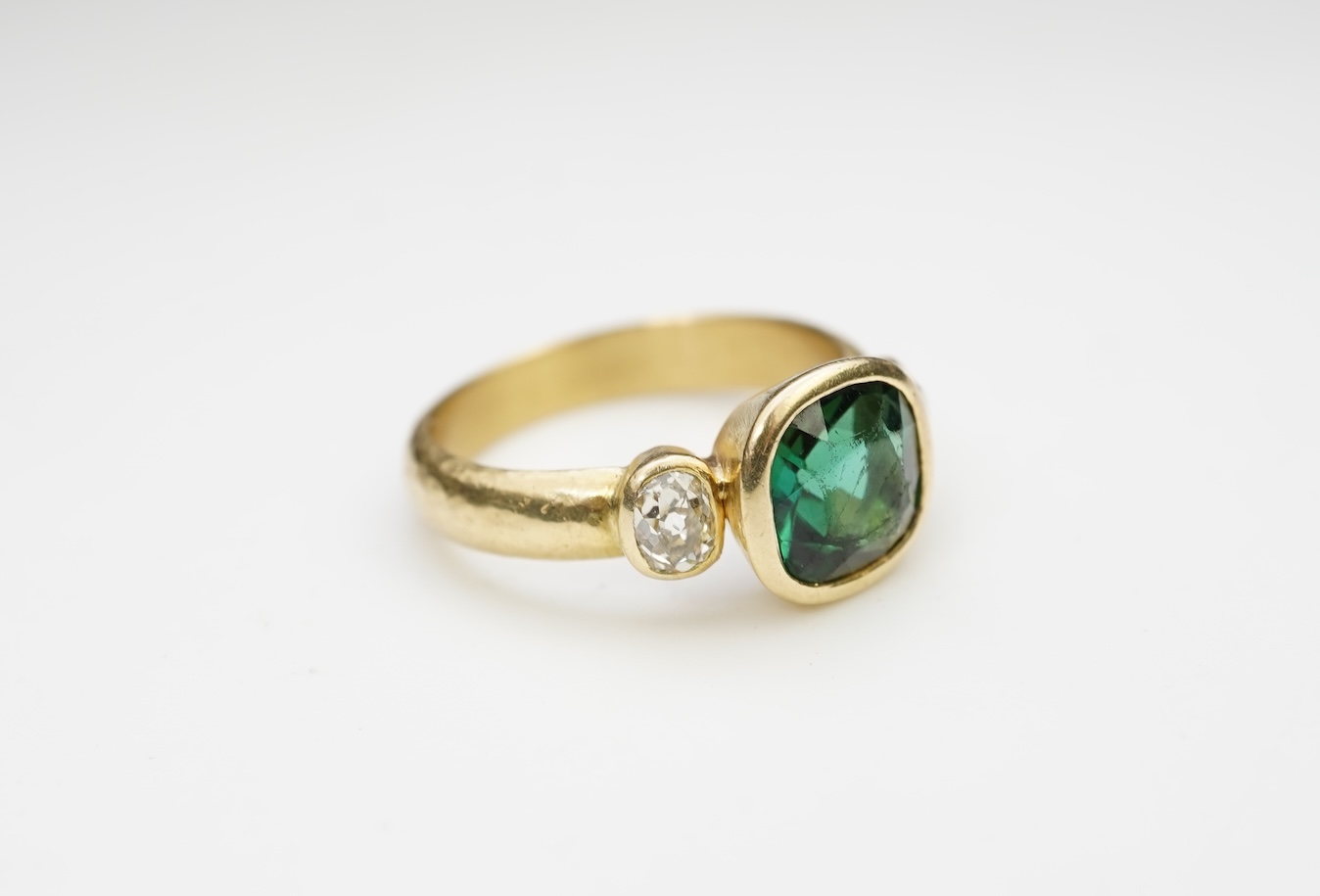 A green tourmaline and diamond ring